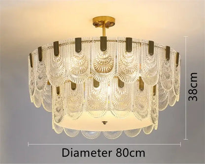 Modern scalloped art glass chandelier with clear fan-shaped panels and gold frame for dining room decorbites art glass light