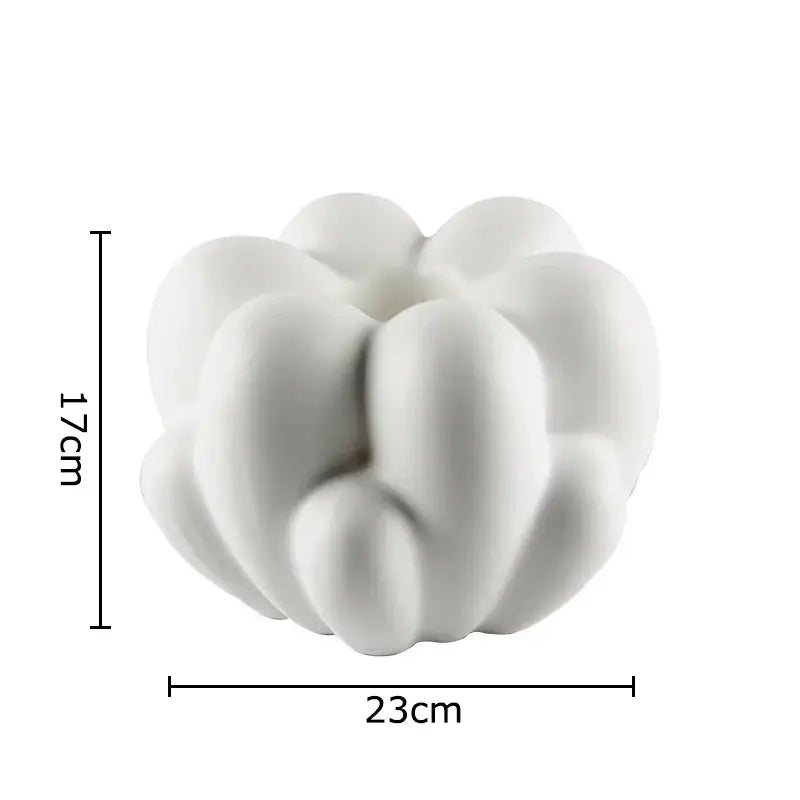White ceramic creative petal vase with modern rounded interconnected lobes for living room decor