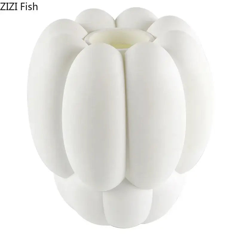 White ceramic creative petal vase with segmented pumpkin-like design for modern living room decor