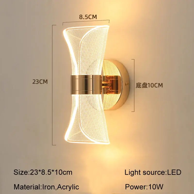 A modern gold nordic acrylic wall light with a curved mesh body and iron base for sculptural bedroom decorbites wall lights