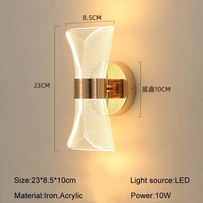 A modern gold nordic acrylic wall light with a curved mesh body and iron base for sculptural bedroom decorbites wall lights