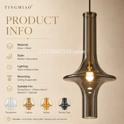 Modern sculptural smoky gray glass pendant light with metallic accents for dining room use multi-finish glass pendant light