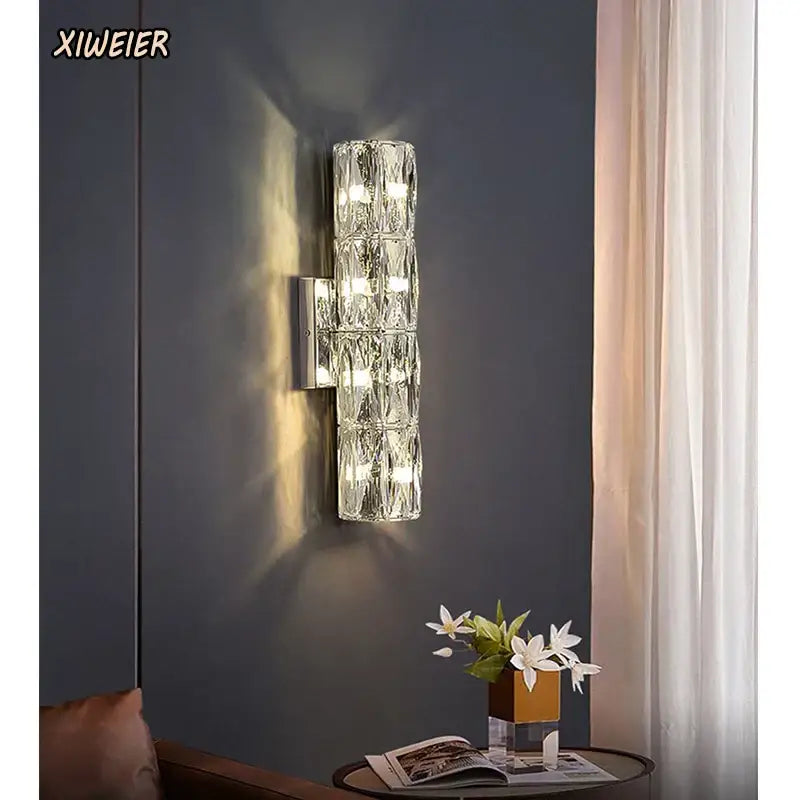 Modern segmented crystal wall lamp with crystal-encrusted design and warm led lighting for stylish living room decorbites wall lamp