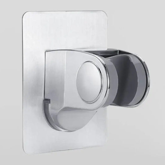 Modern silver adjustable decorbites shower holder with a sleek circular grip for bathroom wall mount use