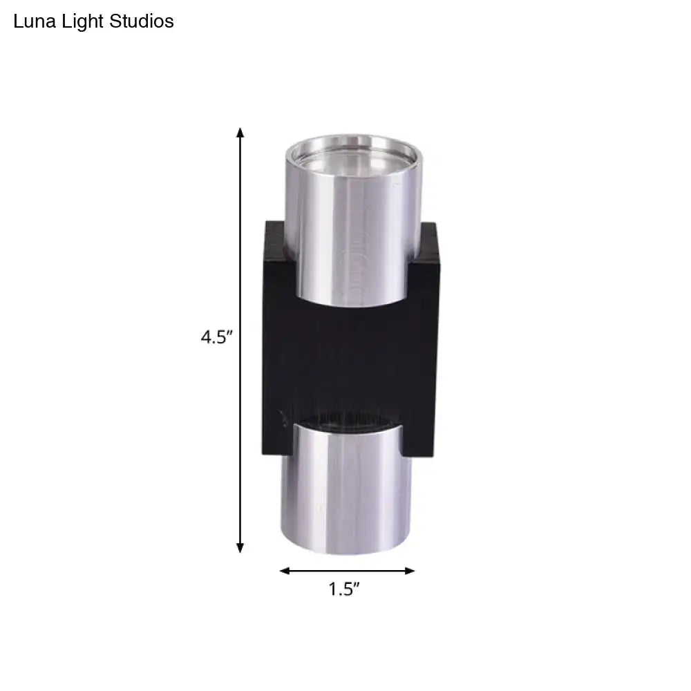 Modern silver aluminum led wall light fixture featuring a sleek black base and two polished chrome cylinders stacked vertically