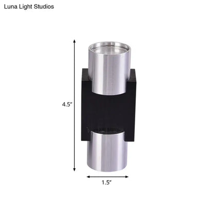 Modern silver aluminum led wall light fixture featuring a sleek black base and two polished chrome cylinders stacked vertically