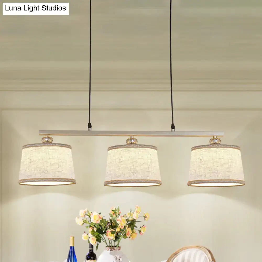 DecorBites™ modern circle pendant light with three flaxen fabric shades and silver metal bar for kitchen island lighting