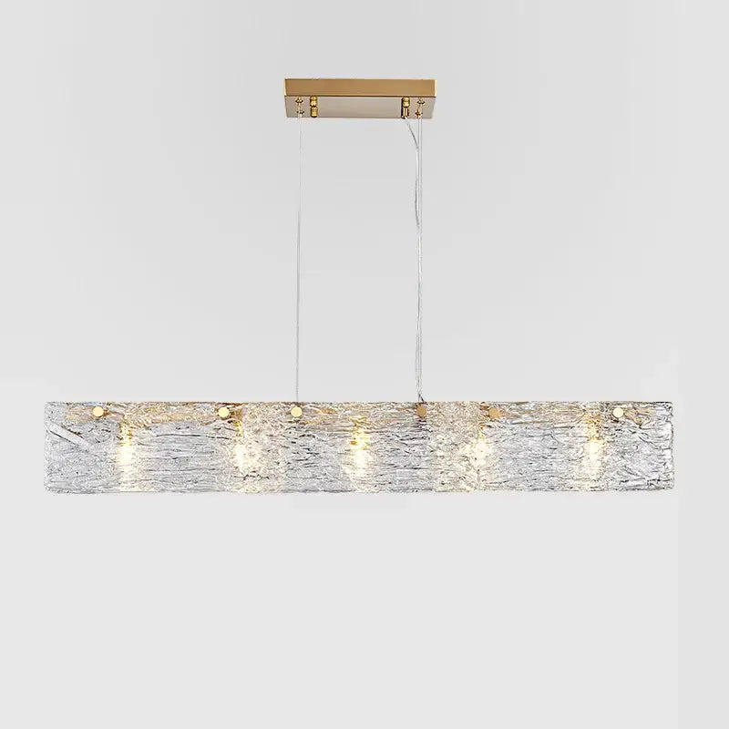 Modern silver and gold glass chandelier featuring a rectangular frosted glass shade with gold-toned hardware decorbites glass chandelier