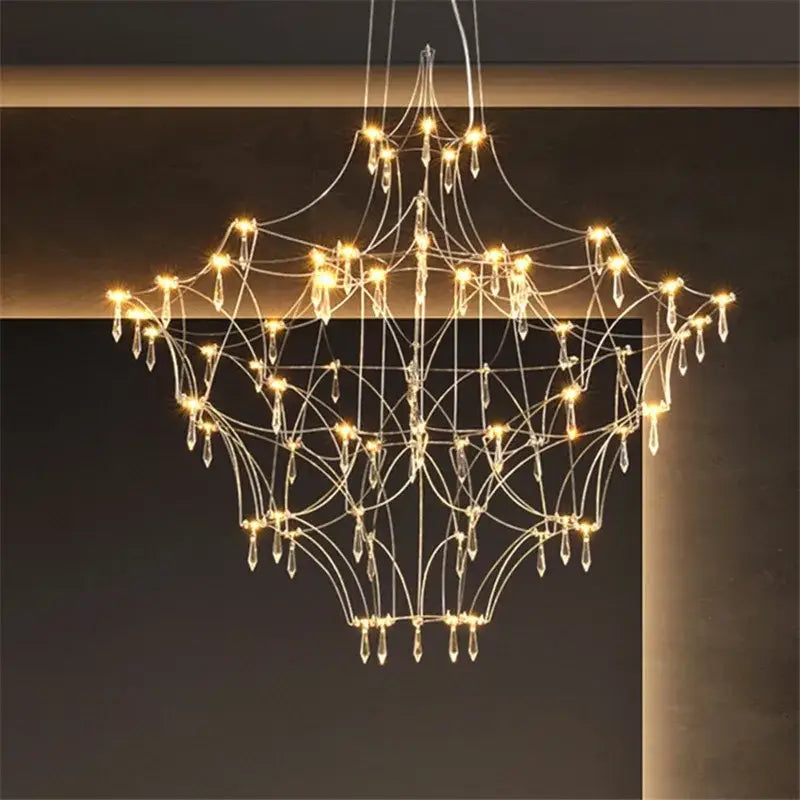 A modern silver and golden lustre crystal chandelier with delicate metal frame and warm light for living room decorbites golden lustre