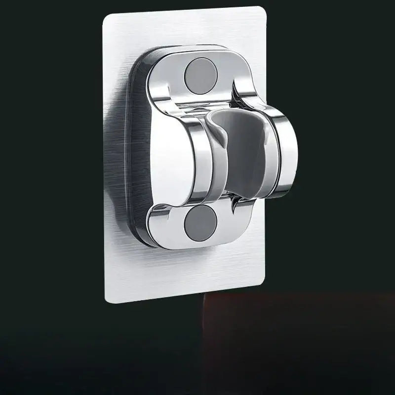 Chrome-finished modern silver and black adjustable shower holder bracket with adhesive backing for wall mounting