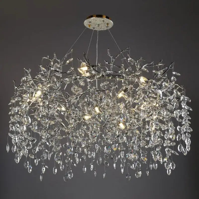 Modern silver and black crystal chrome chandelier with intricate silver branches and teardrop crystals for living room lighting