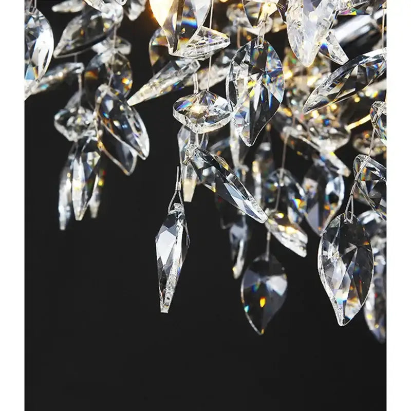 Modern silver and black decorbites crystal pendant chandelier with cascading faceted teardrop glass pendants for dining room