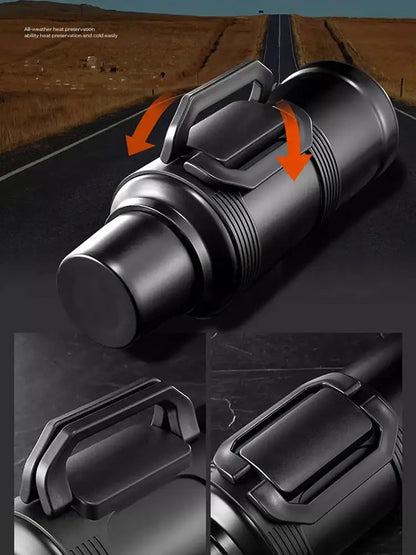 Black rugged flashlight with textured grip and reinforced handle shown beside modern silver and black insulated kettle with glass liner and folding handle