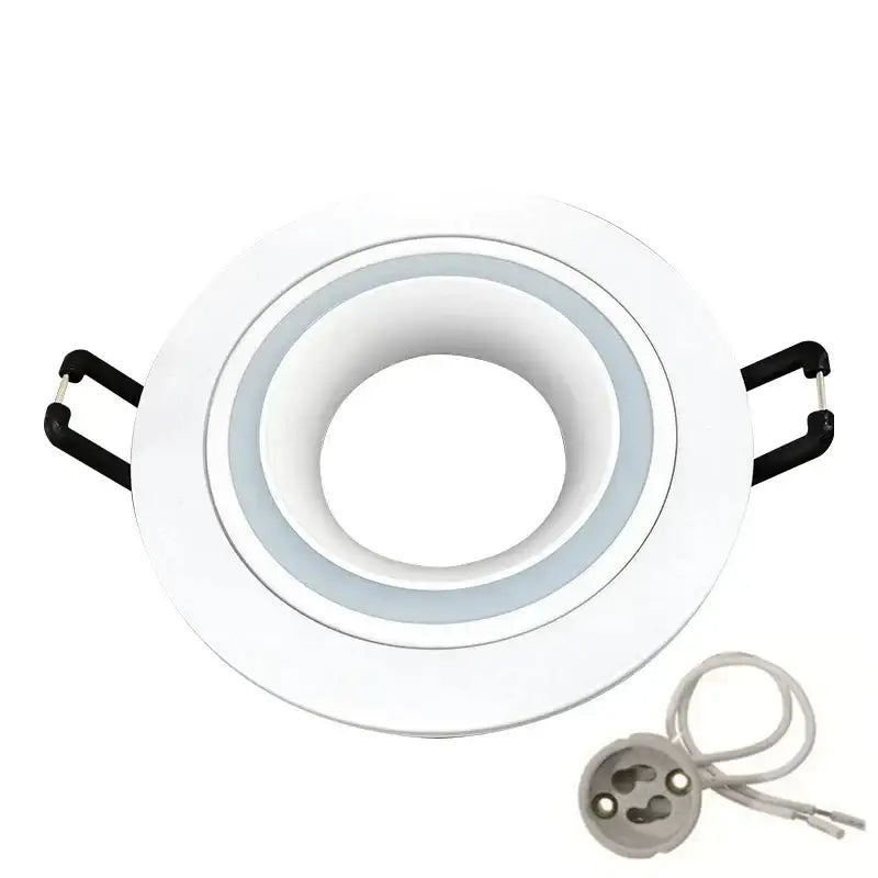 Modern silver and chrome square ceiling downlight frame with white recessed light and black mounting clips for living room