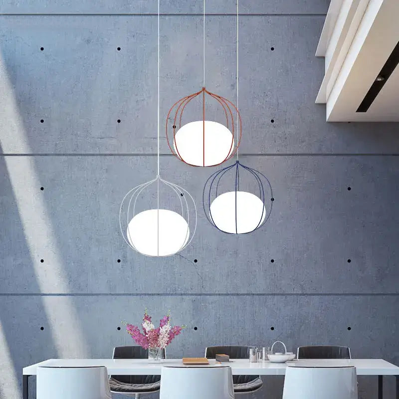 Modern silver and copper birdcage glass ball pendant light with spherical shades and wire frames for dining room lighting
