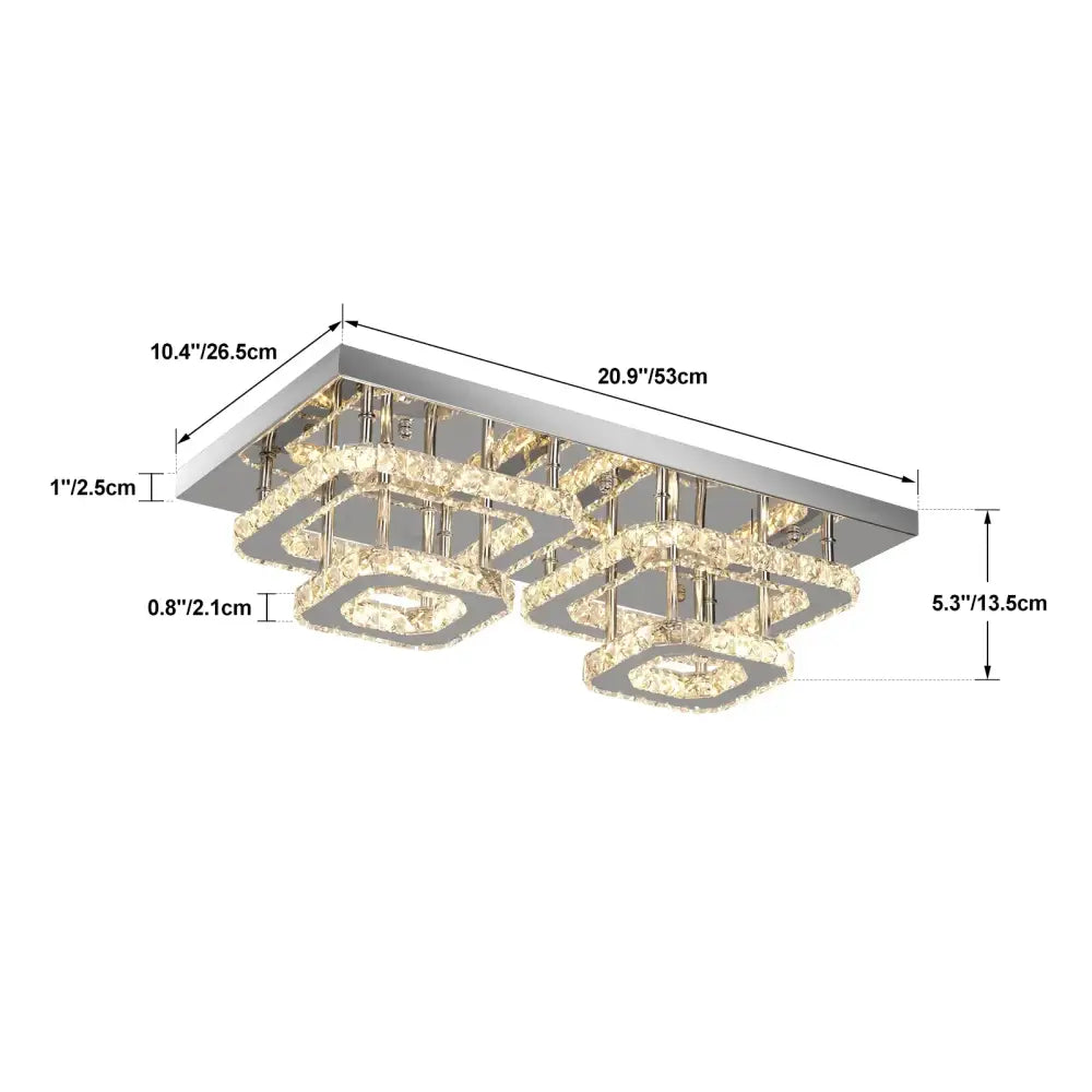 Modern silver crystal ceiling chandelier with sleek chrome finish and layered crystal rings emitting warm light