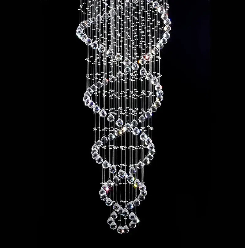 A modern silver decorbites crystal led chandelier with cascading clear faceted beads in spiral tiers for staircase lighting