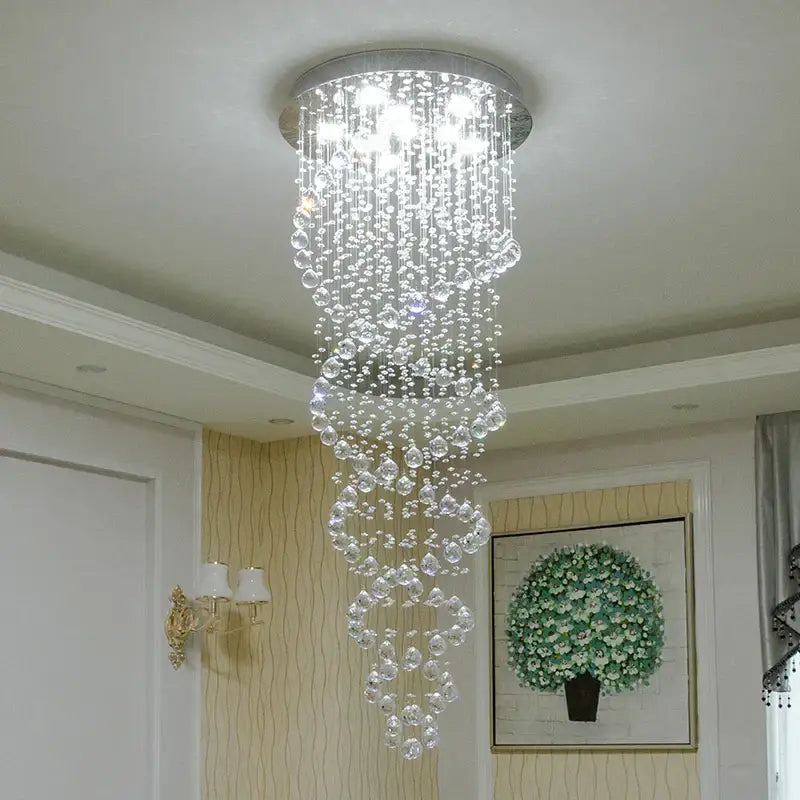 Modern silver crystal led chandelier with cascading clear faceted beads by DecorBites for staircase lighting
