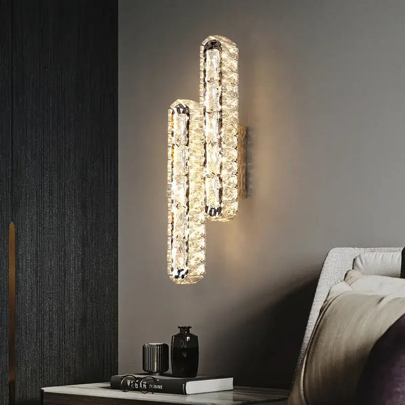 Modern silver crystal led wall lamp with sleek elongated design featuring decorbites crystal led elements for bedroom sconce decor