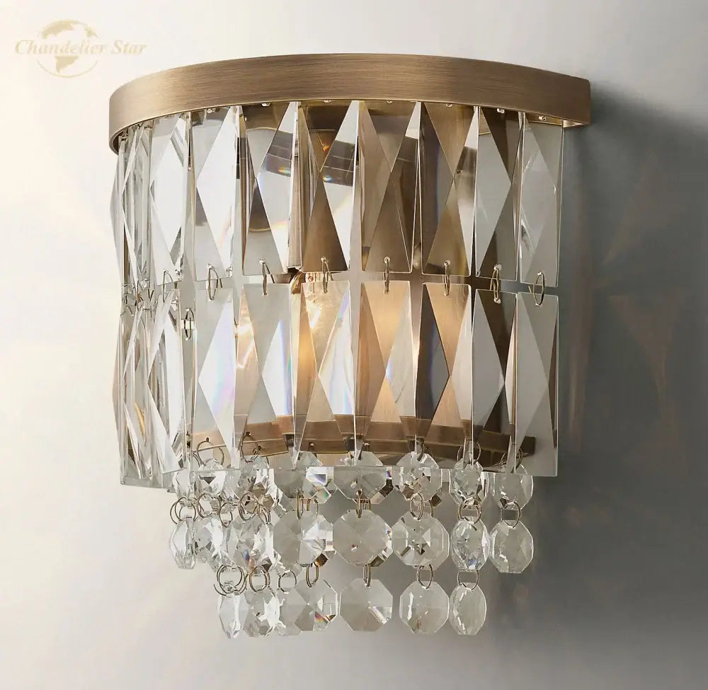 Modern silver crystal led wall sconce with brass finish and faceted teardrop prisms for elegant decorbites crystal led decor