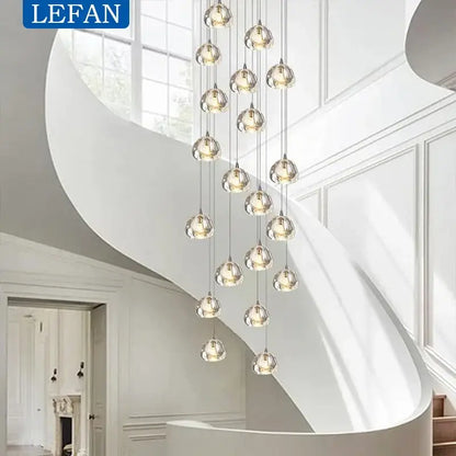 Modern silver crystal pendant light featuring clear glass globes with cord pendant installation for dining room use