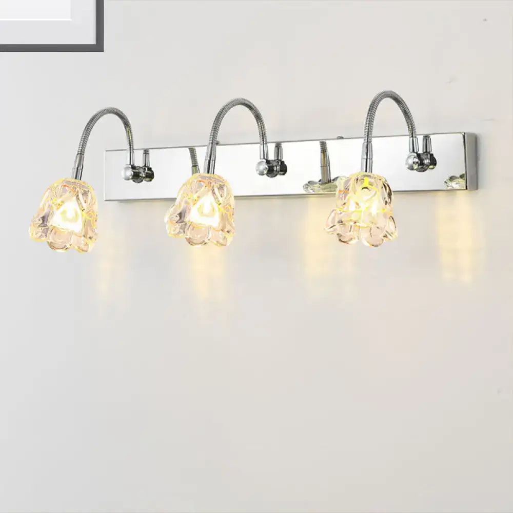 Modern silver crystal petal bathroom wall vanity light with three adjustable chrome gooseneck arm flower-shaped shades