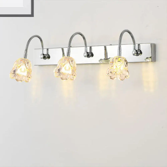 Modern silver crystal petal bathroom wall vanity light with three adjustable chrome gooseneck arm flower-shaped shades