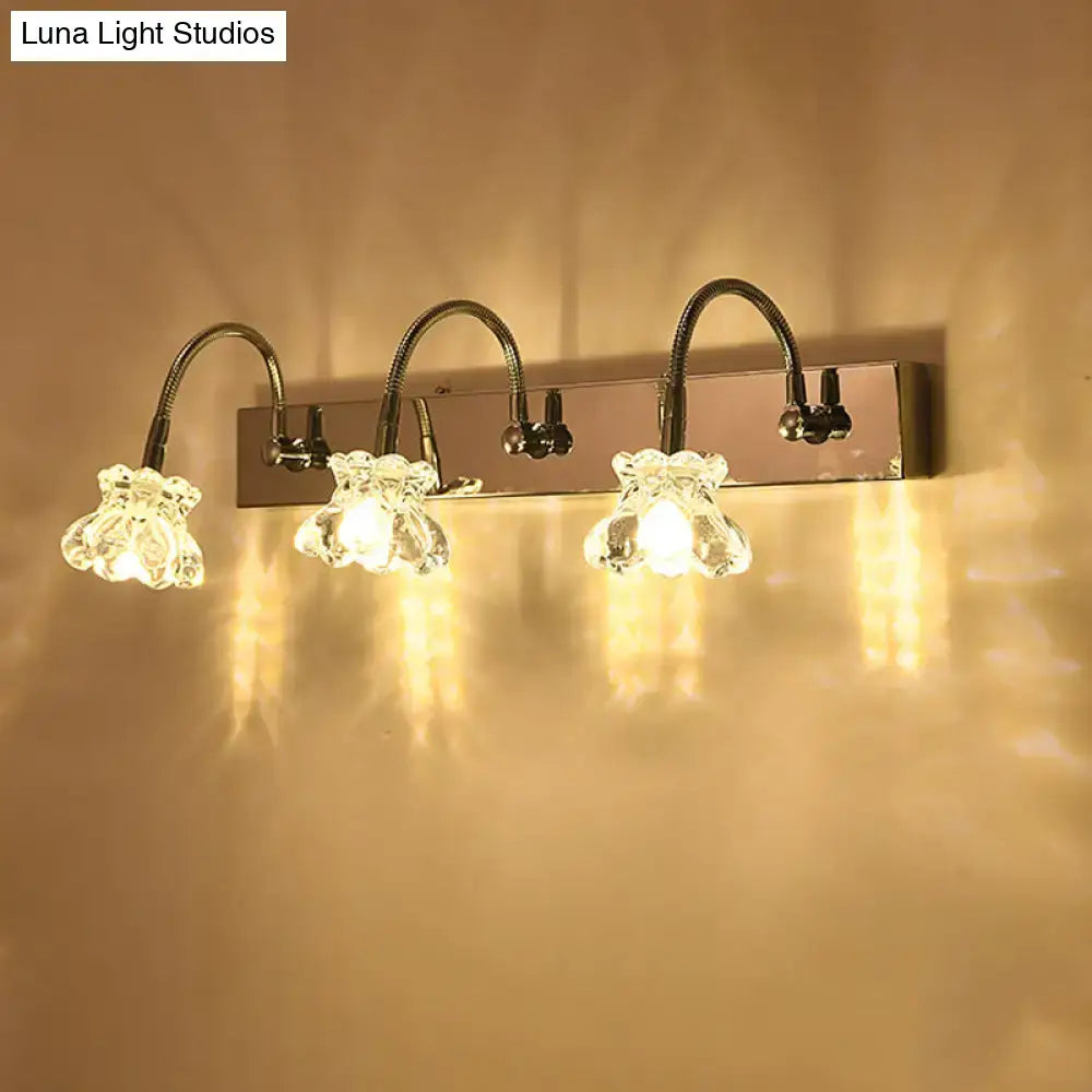Modern silver crystal petal bathroom wall vanity light with chrome finish and three flexible gooseneck arms