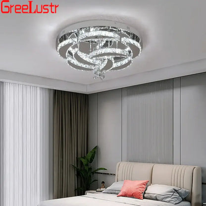 Modern silver crystal raindrop led chandelier ceiling light with concentric rings and chrome metal decorbites crystal raindrop
