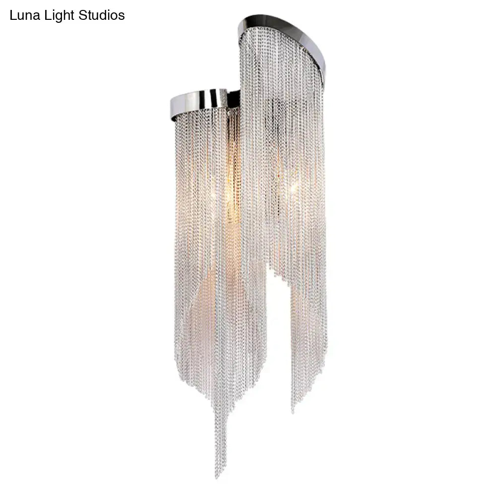 Modern silver crystal tassel wall light with chrome finish and cascading silver chain fringe for living room wall light