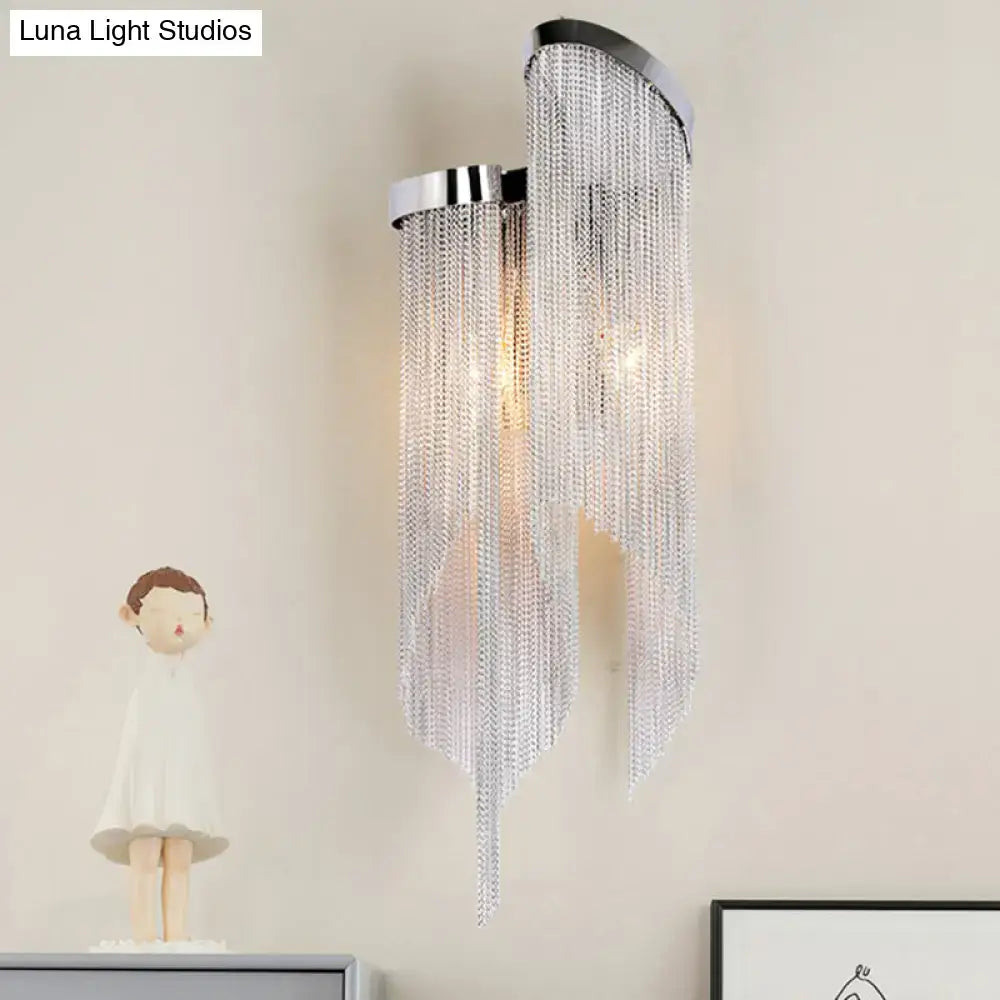 Modern silver wall light with light silver chrome finish and cascading clear crystal tassel chains for living room