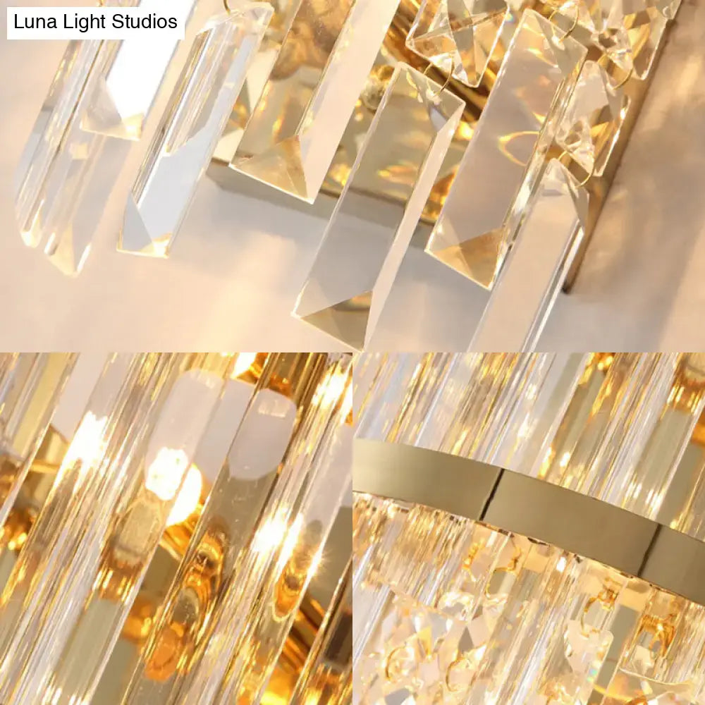 Modern silver crystal tiered wall mounted wall light with cascading clear prisms and polished gold metal accents