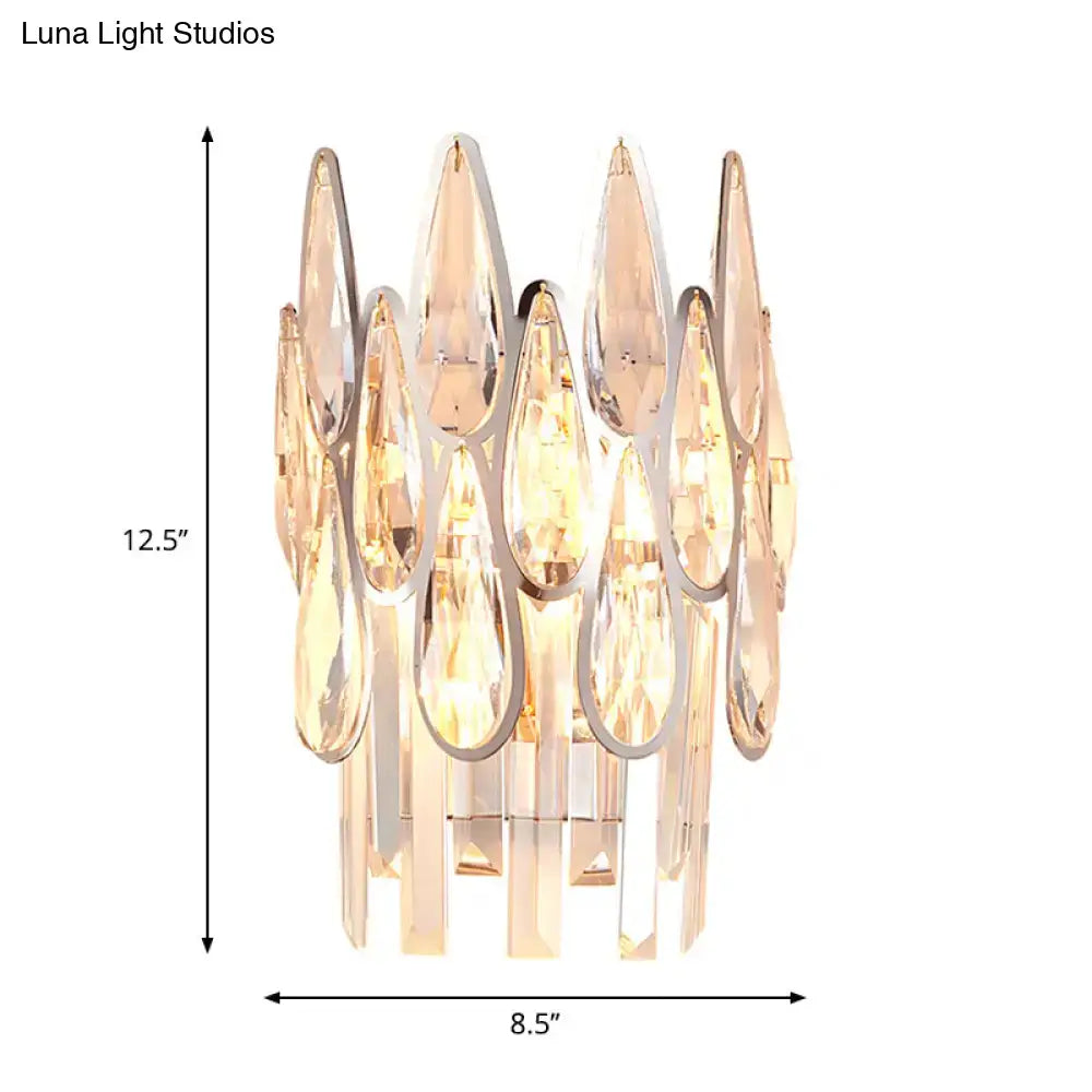 Modern silver crystal wall sconce with teardrop prisms in polished chrome for elegant living room double layer lighting