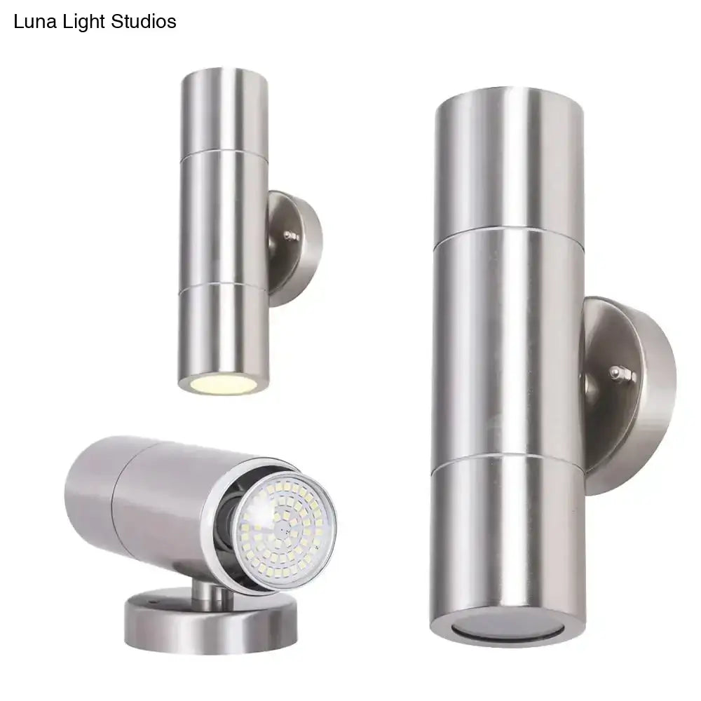 Modern silver cylindrical stainless steel wall sconces outdoor with sleek dual-light led spotlight design