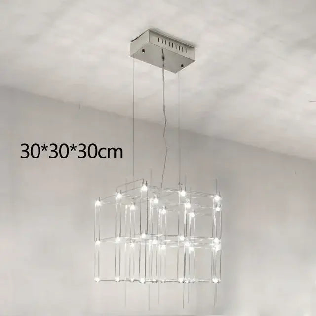 Modern silver decorbites cosmos chandelier with sleek chrome finish and crystal rods forming an illuminated cube for dining room