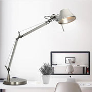 Modern silver double arm clip table lamp with a sleek adjustable matte-finished shade for bedroom desk use