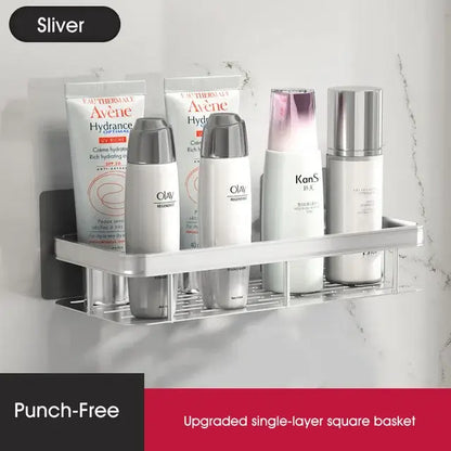 Modern silver metallic double tiered decorbites corner shower shelf holding multiple skincare products for bathroom storage
