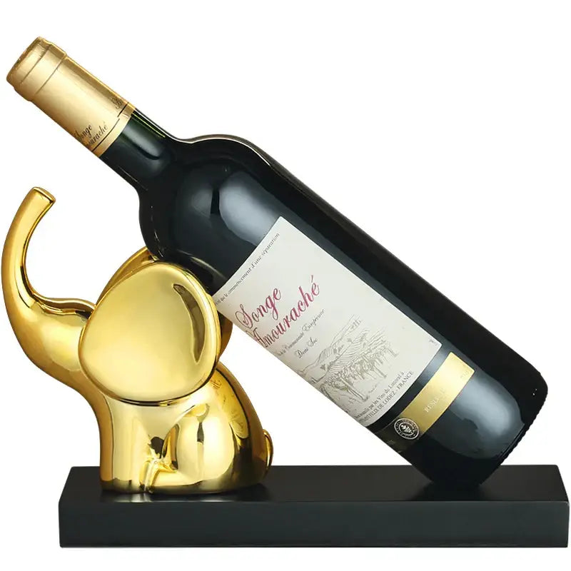 Modern silver elephant wine rack table ornament with sleek reflective finish serving as a wine rack table centerpiece