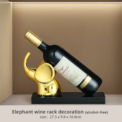Modern gold elephant wine rack table ornament with sleek reflective finish for elegant dining room display