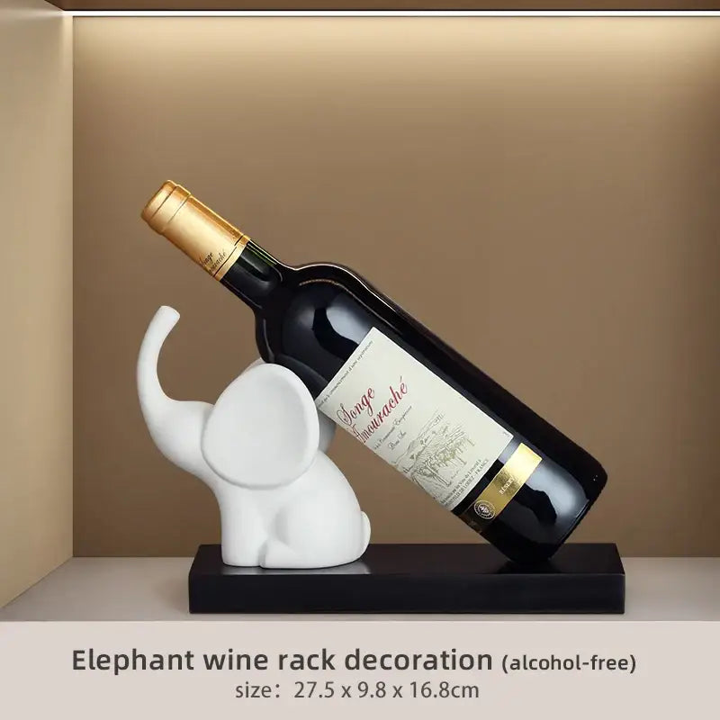 White ceramic elephant wine rack table ornament with sleek minimalist design for modern dining room decor