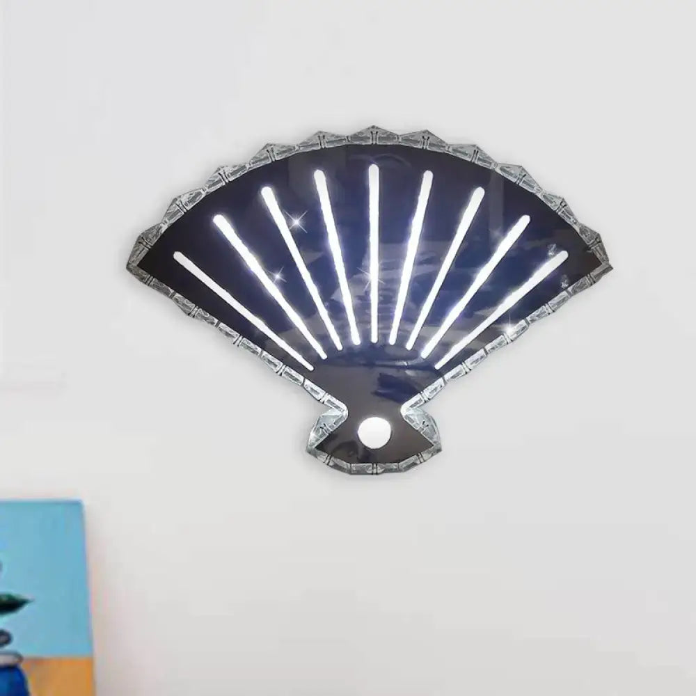 A sleek black fan wall lamp with silver metallic edges and white led light strips for modern bedroom décor
