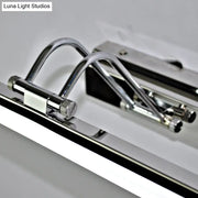 Modern silver finish linear wall mount led vanity lamp with chrome-finished metal track lighting and adjustable curved arms