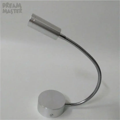 Silver metallic led wall lamp with flexible gooseneck and cylindrical head for modern bedroom reading sconce