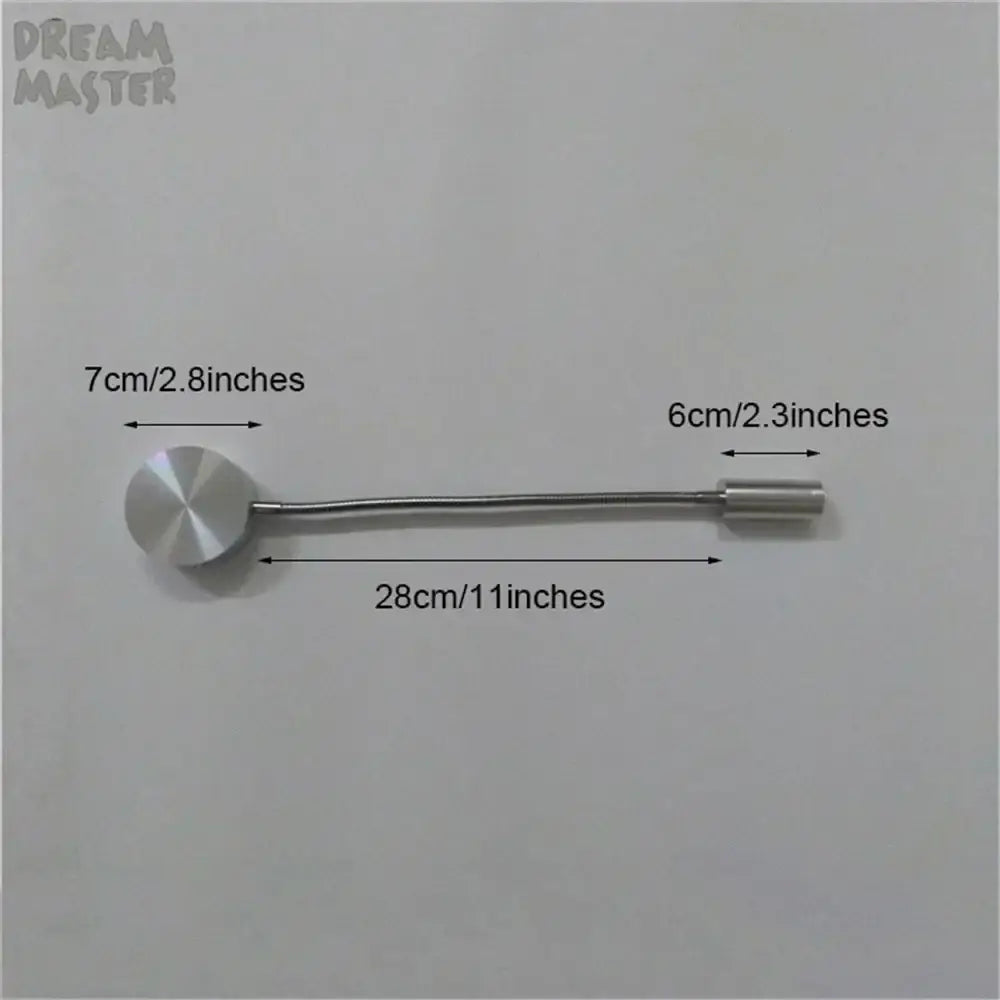 Modern silver flexible led wall lamp featuring a sleek metallic pin with circular head and polished finish for bedroom reading