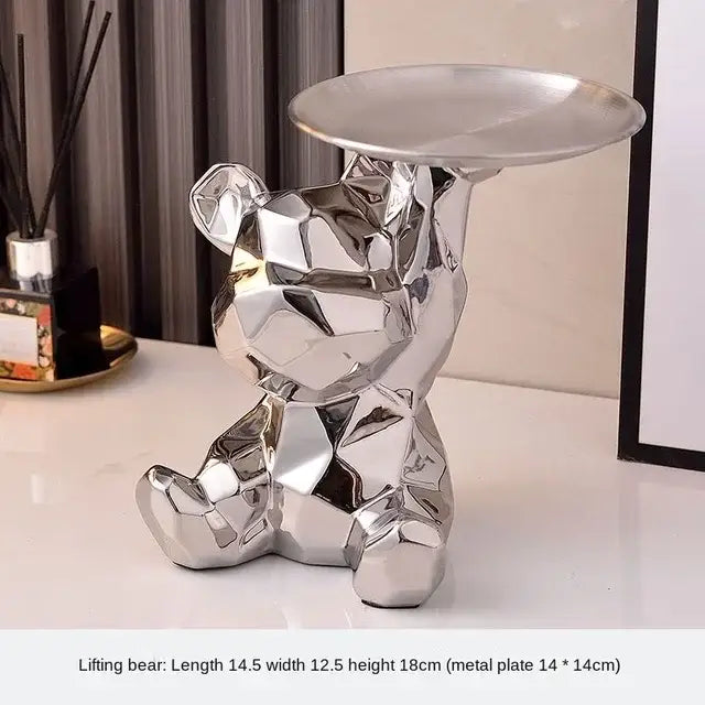 Modern silver geometric bear storage box holding a round metal plate for living room decor by Decorbites geometric bear