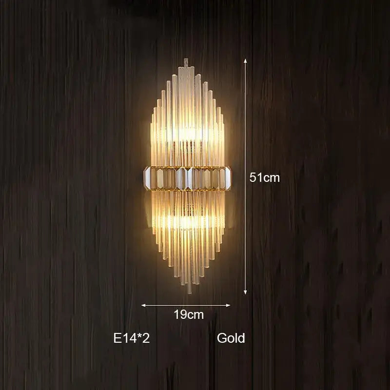 Gold-finished wall lamp with cascading clear glass tubes and central decorative band decorbites crystal strip led design