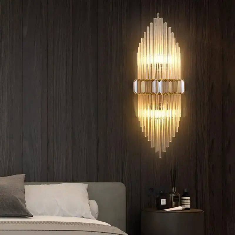Gold-toned wall lamp with cascading glass rods and reflective crystal accents for decorbites crystal strip led lighting