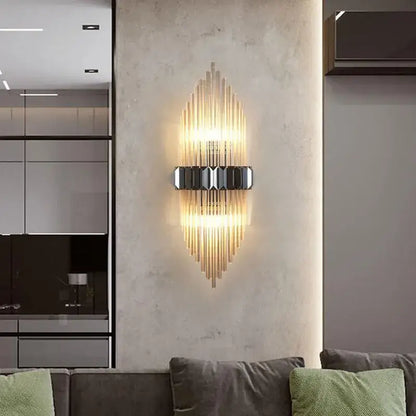 Modern gold-toned wall lamp with vertical glass rods and black geometric accent featuring decorbites crystal strip led design