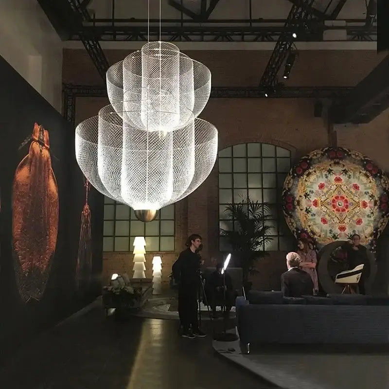 Modern silver geometric iron chandelier with tiered delicate mesh design and warm light for dining room decorbites geometric iron