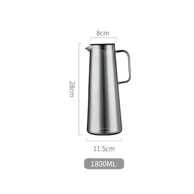 A sleek stainless steel modern silver water pitcher with lid and sturdy handle for kitchen juice and glass water use